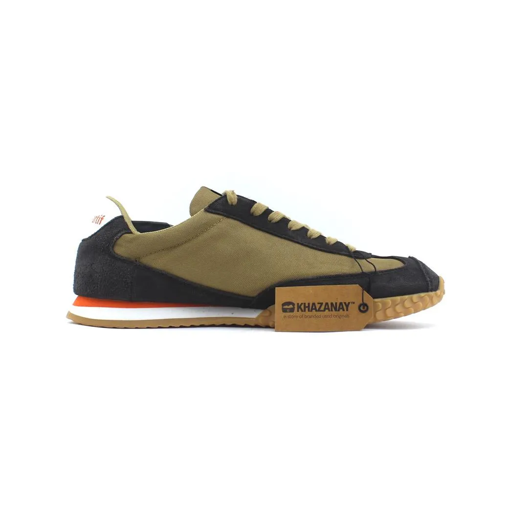 LE COQ SPORTIF .
